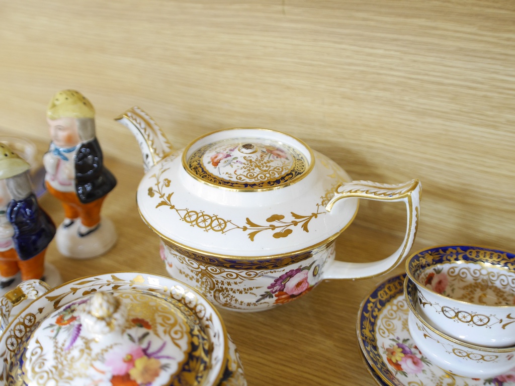 An English part teaset, c.1825 and six Royal Crown Derby coffee cans and saucers etc. Condition - some items cracked chipped and losses to gilding, teapot cover finial broken